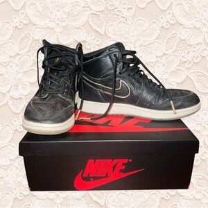 Boys Nike Black High-Top Sneakers with Gold Details